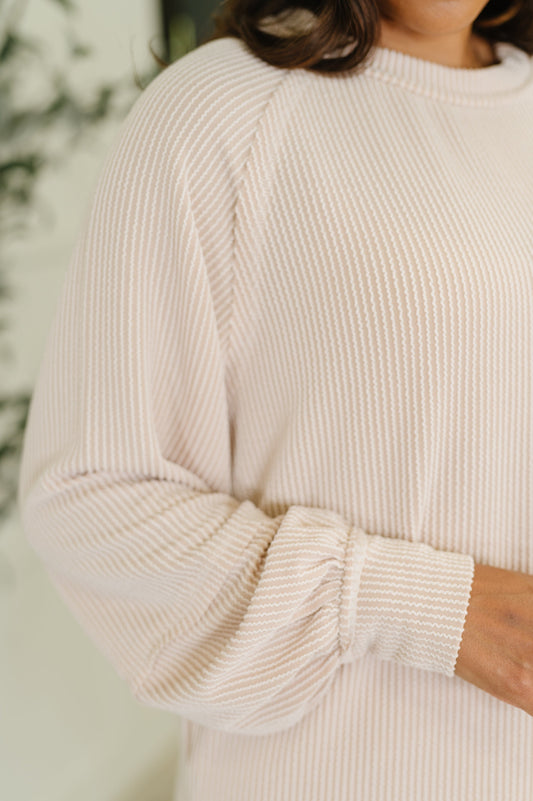 Close up of ribbed knit fabric and neckline details on Winnie Top