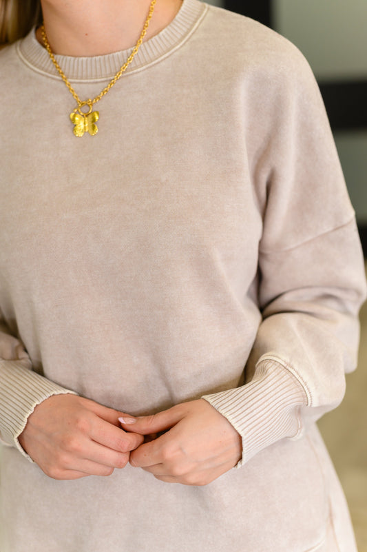 Close-up of Safina Mineral Wash Pullover neckline and cuff details in stretchy cotton blend fleece.