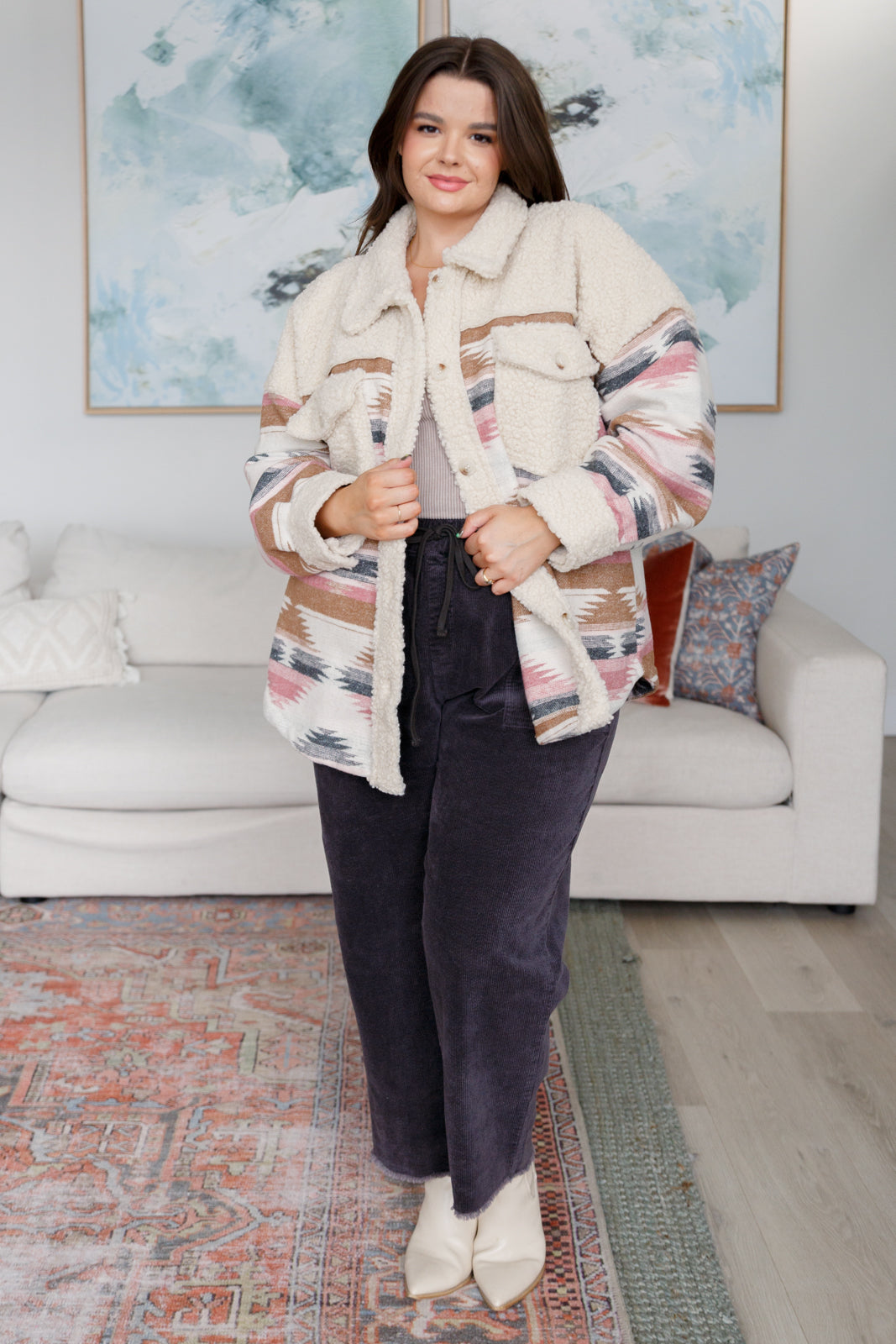 Plus size Sedona Sunset Shacket showing cozy sherpa fleece and Aztec design.