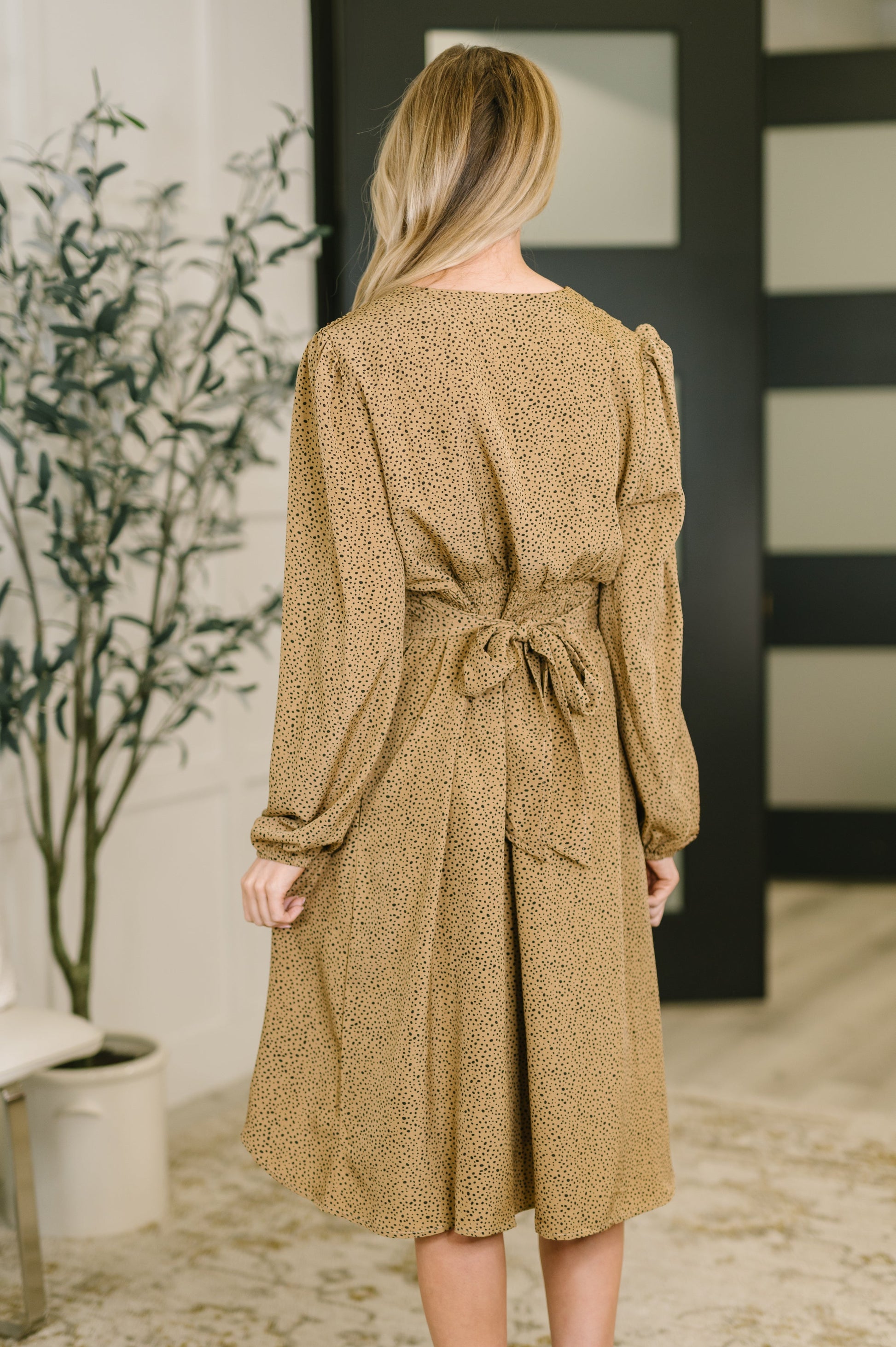 Back view of Selah V-Neck Dress showing smocked elastic waistband.