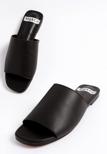 Shanon Slip-On Leather Flats in Black with open square toe and slip on design.