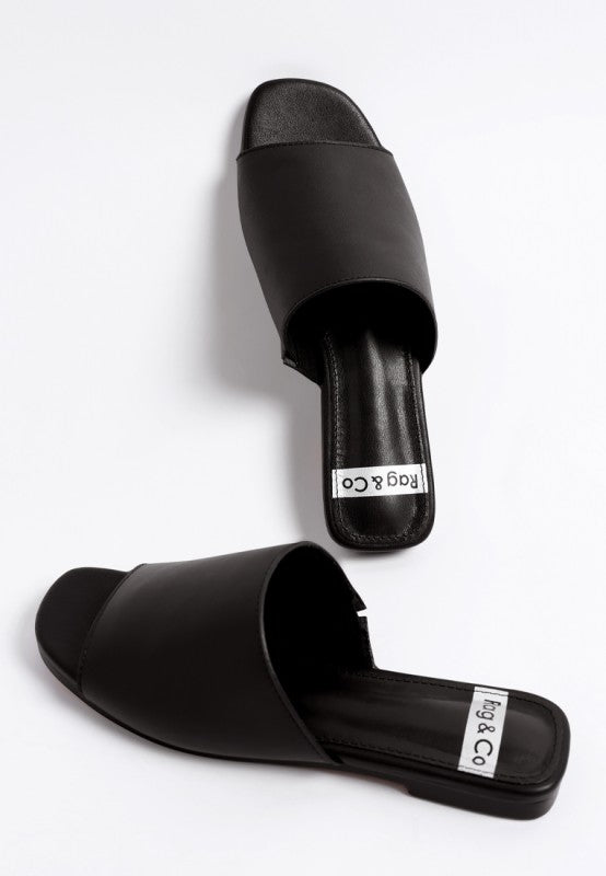 Front view of Shanon Slip-On Leather Flats in Black showing square toe leather flats.
