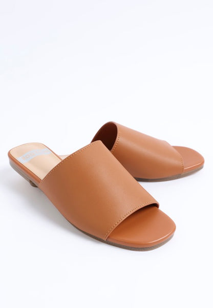 Side view of Shanon Slip-On Leather Flats in Tan genuine leather slip on design.