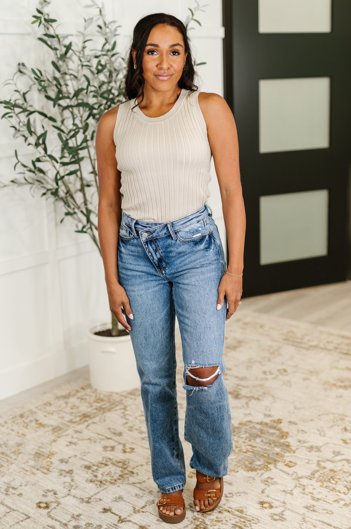 Full body outfit with Tatum Ribbed Crew Neck Tank Top in cream styled with jeans, high stretch cotton ribbed knit