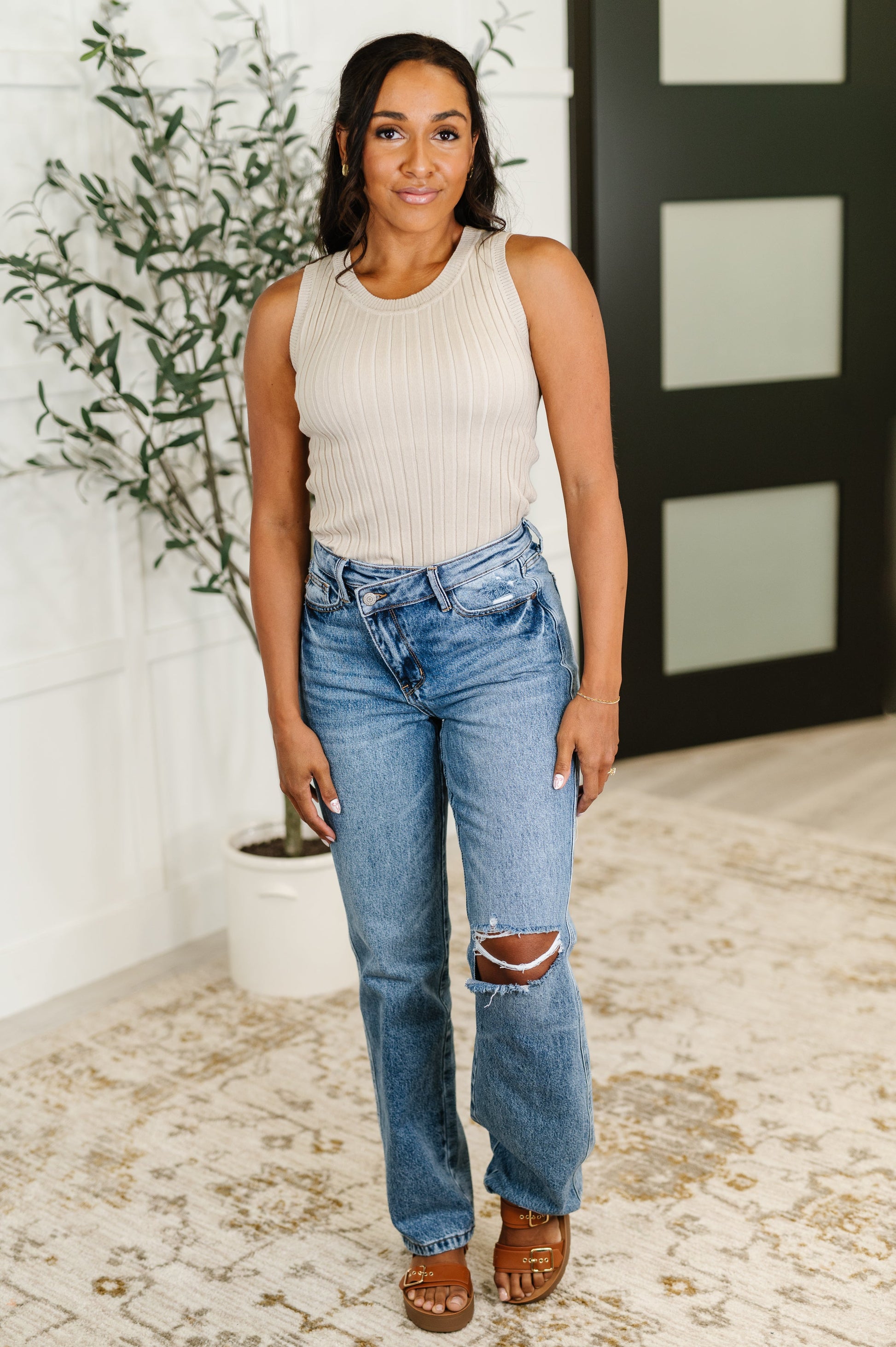 Full body outfit with Tatum Ribbed Crew Neck Tank Top in cream styled with jeans, high stretch cotton ribbed knit