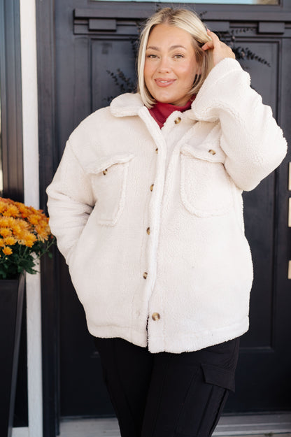 Plus size model wearing Shreya Sherpa Coat in White with collared neckline and relaxed fit.