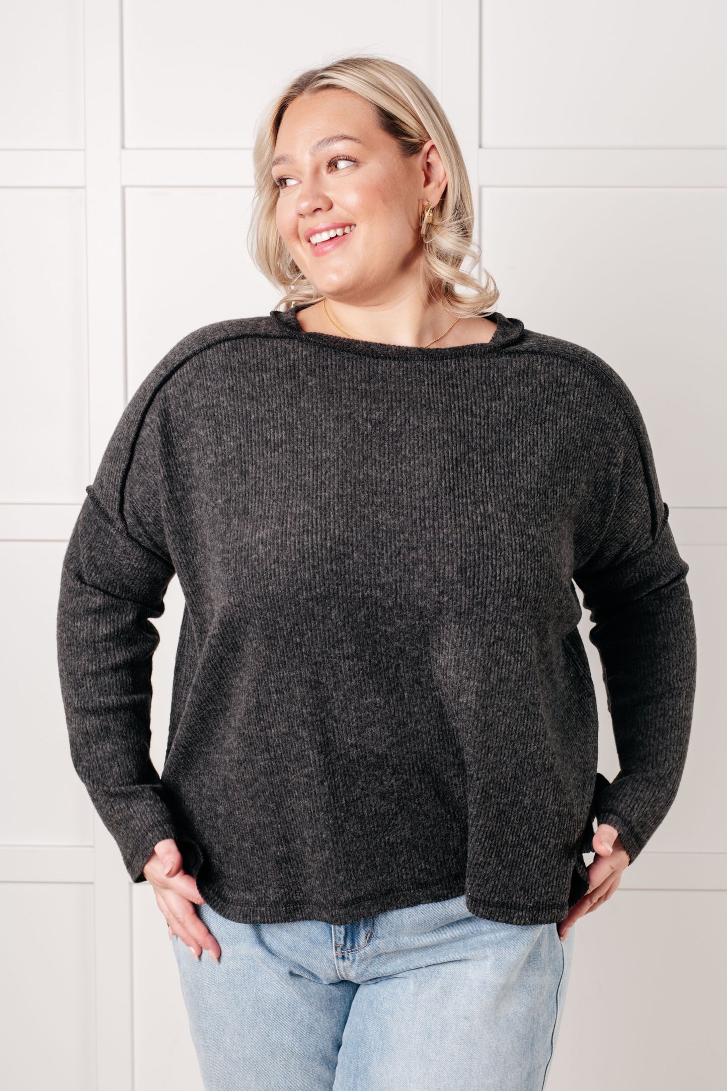 Plus size Simon Ribbed Hacci Sweater front view in black with drop shoulders and banded neckline.