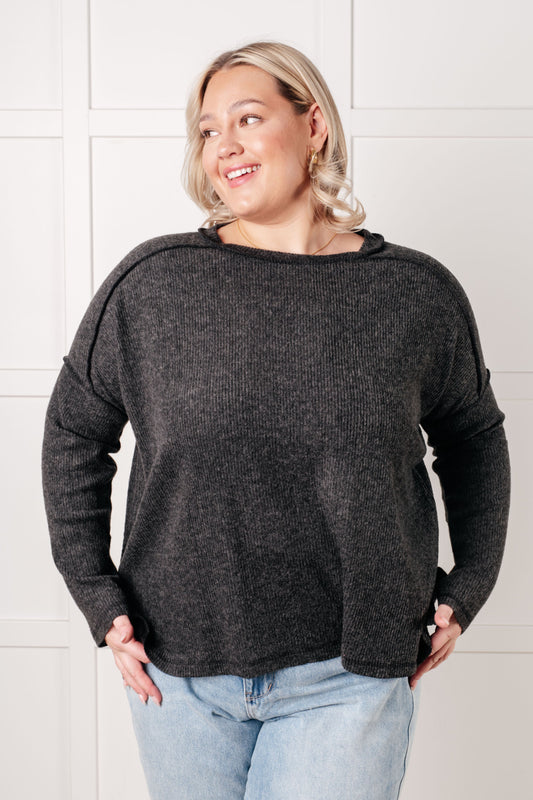 Plus size Simon Ribbed Hacci Sweater front view in black with drop shoulders and banded neckline.