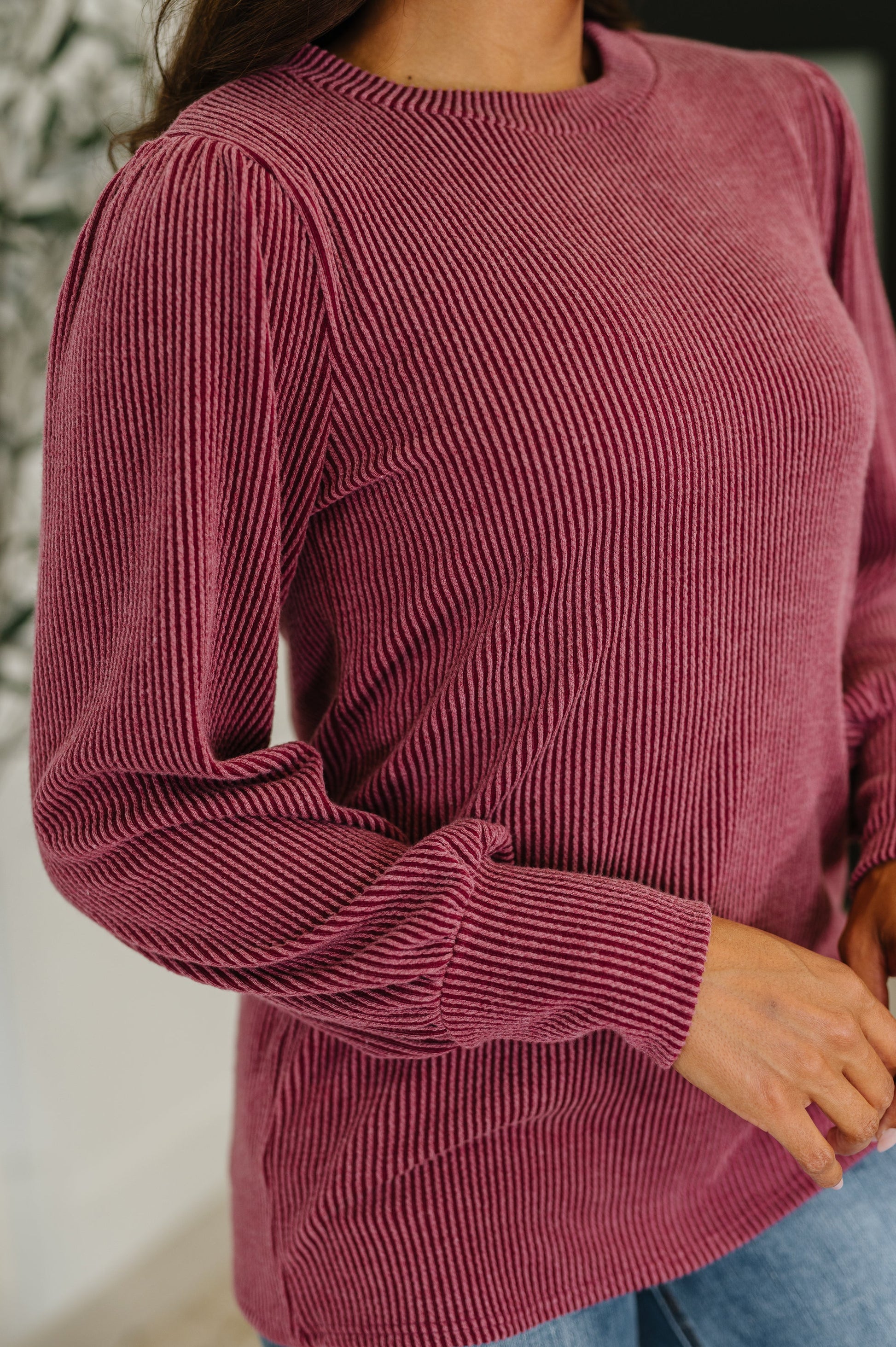 Close-up of Shannon Balloon Sleeve Knit Top neckline and ribbed knit texture in berry