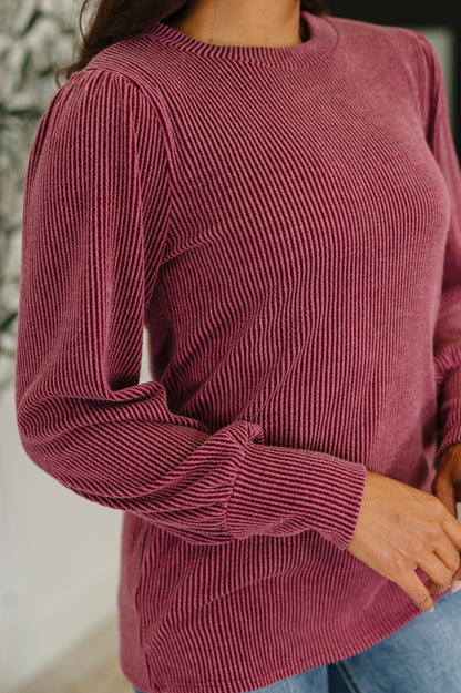 Close-up of Shannon Balloon Sleeve Knit Top neckline and ribbed knit texture in berry