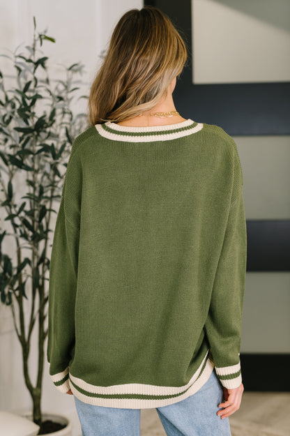 Back view of Somara Cardigan showing relaxed silhouette and mid-weight knit.