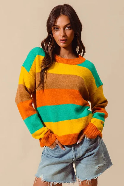 Front view of Sunny Multi Color Stripe Sweater with ribbed detail and long sleeves in rust, mustard, jade, and brown.