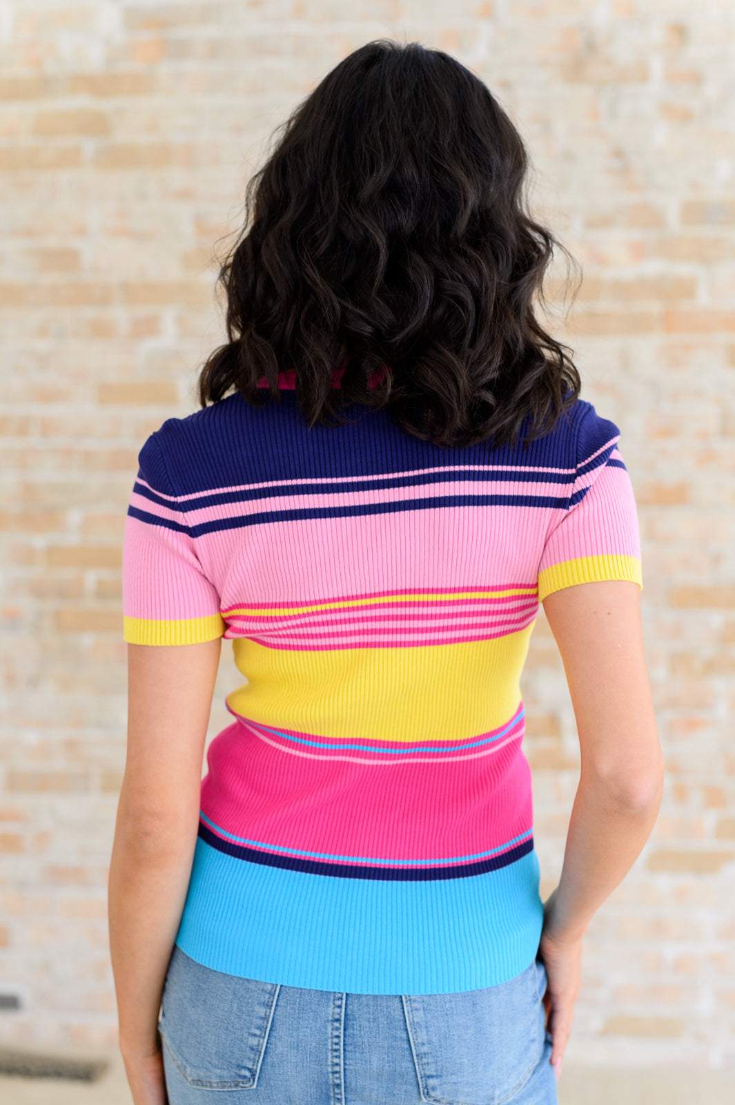 Back view of Suzette Striped Top highlighting multicolor stripes