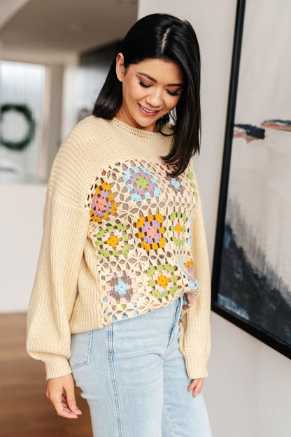 Side angle of Granny Square Sweater highlighting balloon sleeves and dropped shoulder.