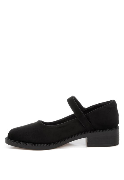 Side angle of Stivah Mary Janes inside view highlighting 1.5 inch block heel.