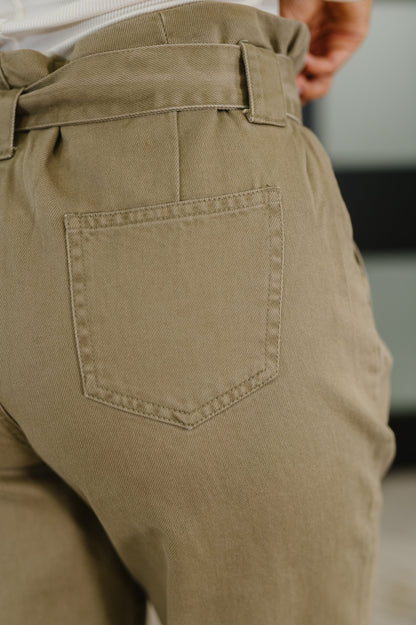 Close-up of back patch pockets on Audie High Waist Trousers in beige twill.