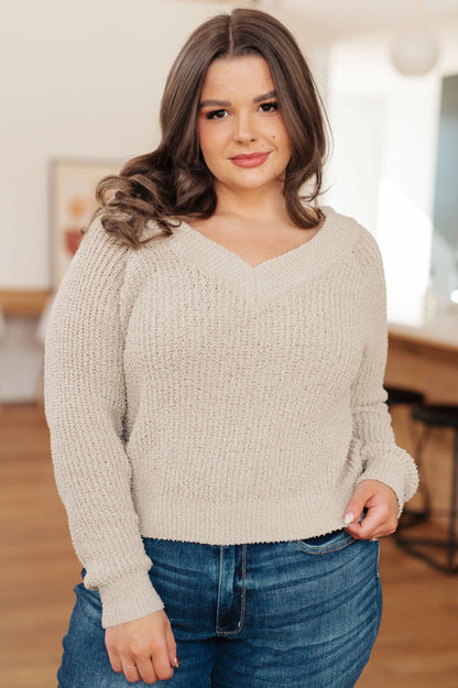 Front view of plus size Suki V-Neck Sweater showing slim silhouette.