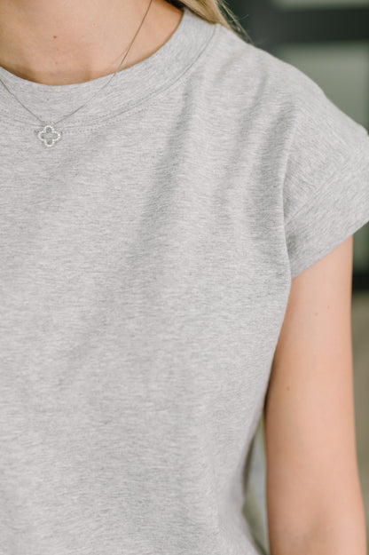 Close up of Sweeney Casual Dress in Heather Gray knit texture and neckline detail.