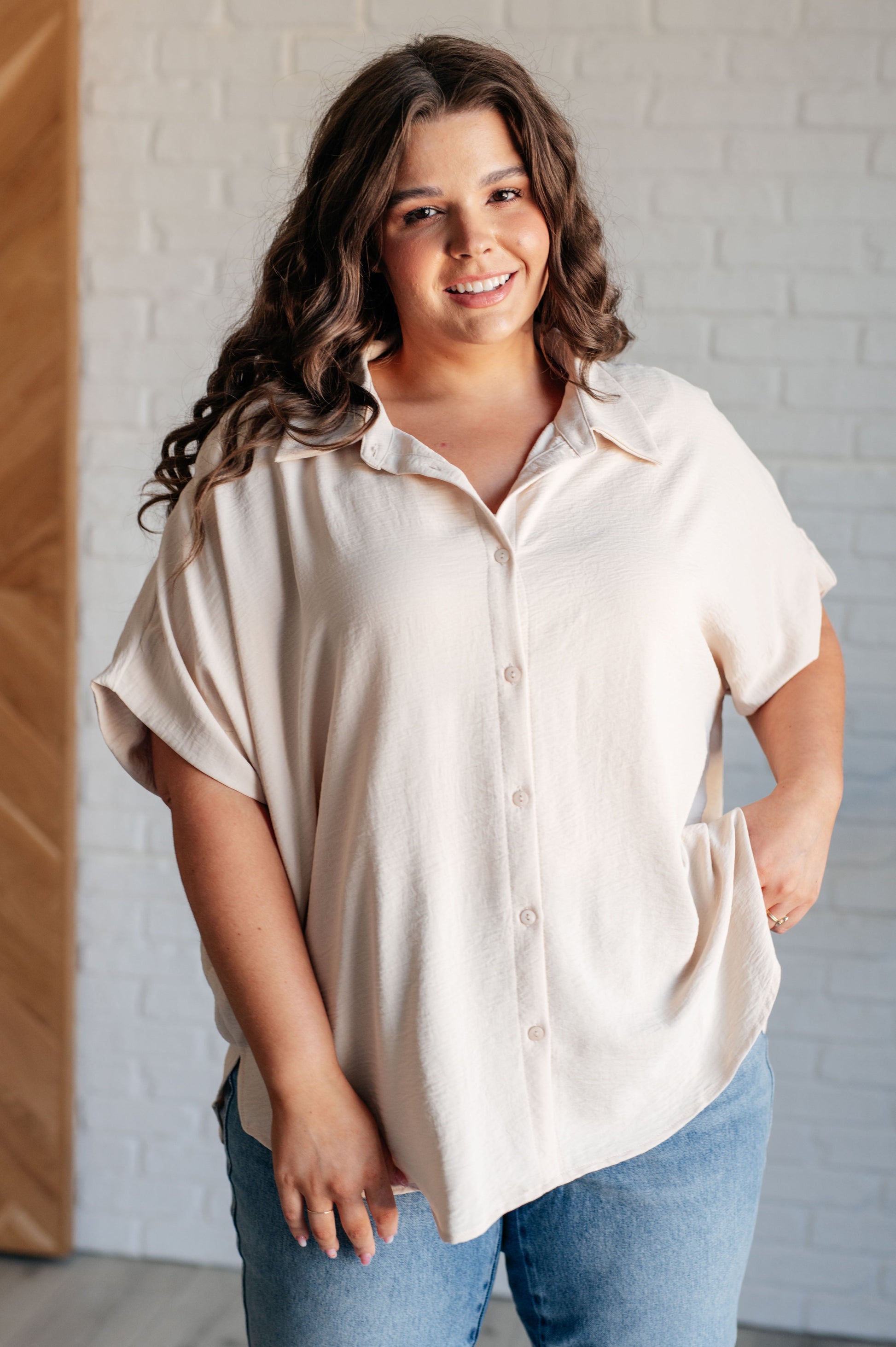 Women's Button Down Blouse in Oatmeal, featuring textured woven fabric, lightweight design, fold-over collar, short dolman sleeves, and button front closure. Perfect for a stylish, laid-back look.