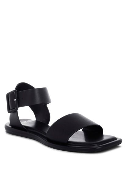 Front view of Tayana Chunky Buckle Strap Flats showing open square toe design.