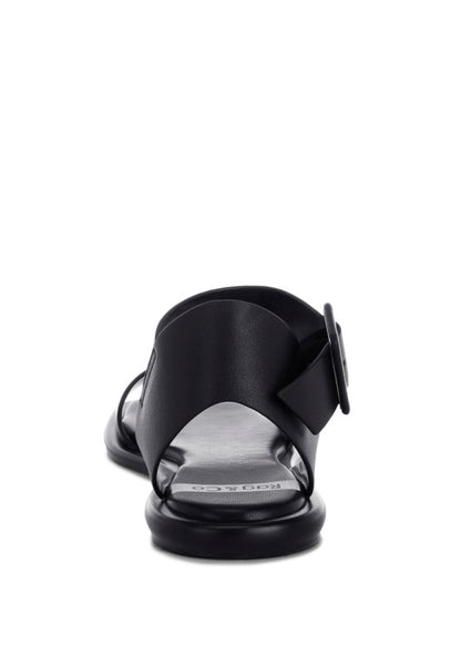 Back angle of Tayana Chunky Buckle Strap Flats ankle strap fastening detail.