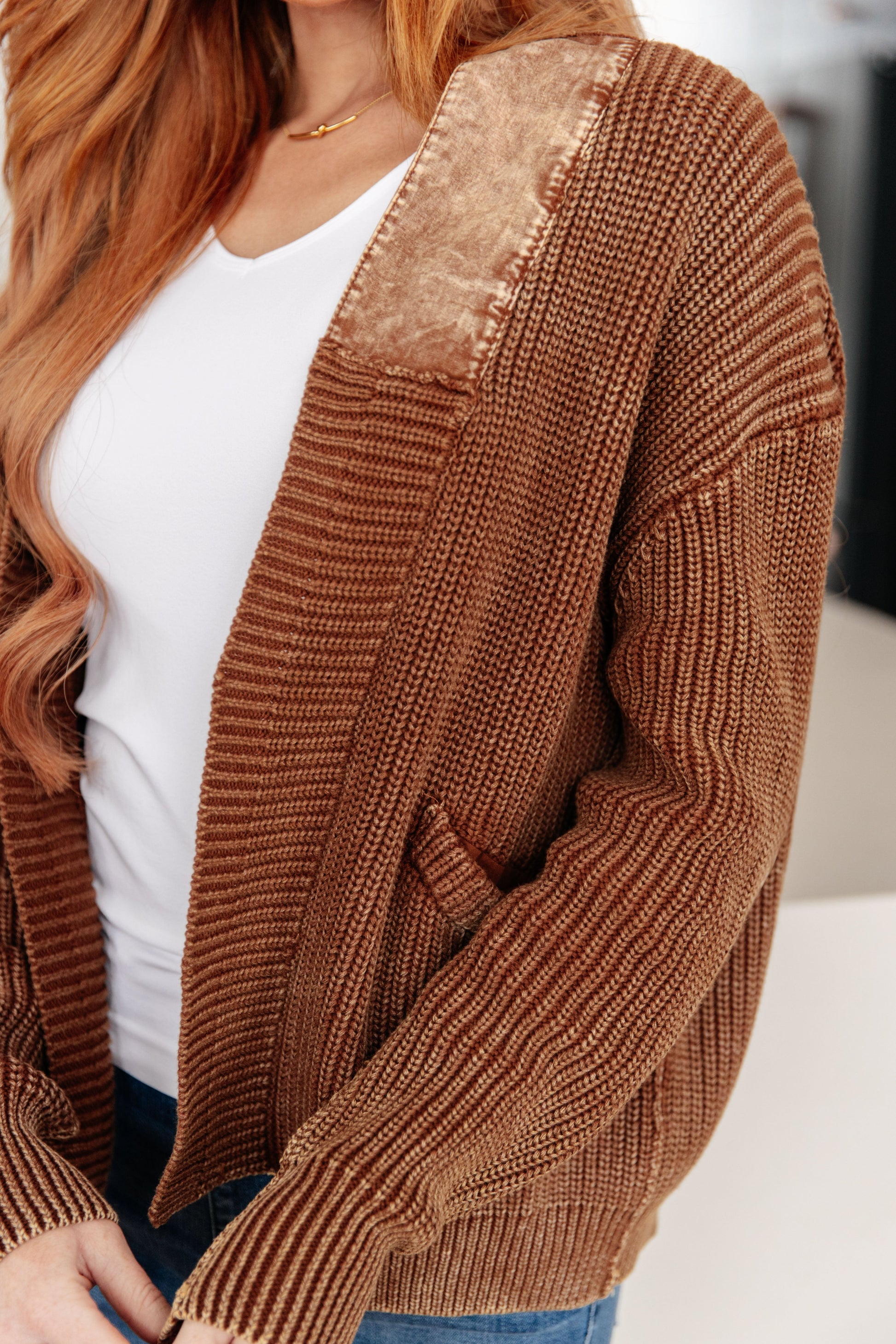 Close-up of Talia Grandpa Cardigan elbow patch and textured sweater knit details.