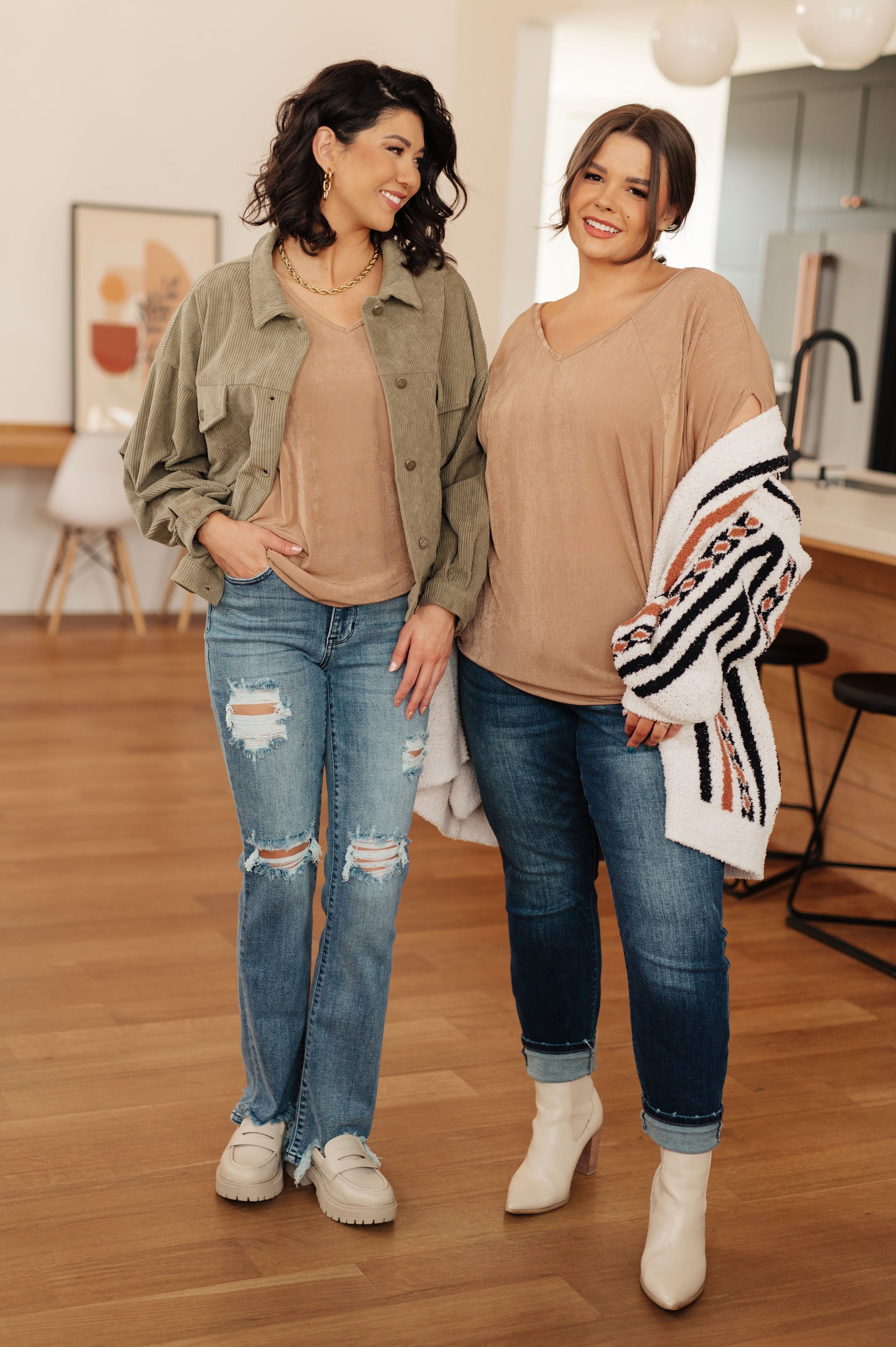 Standard and plus-size models wearing Alessandra V-Neck Top in taupe, styled with jeans.