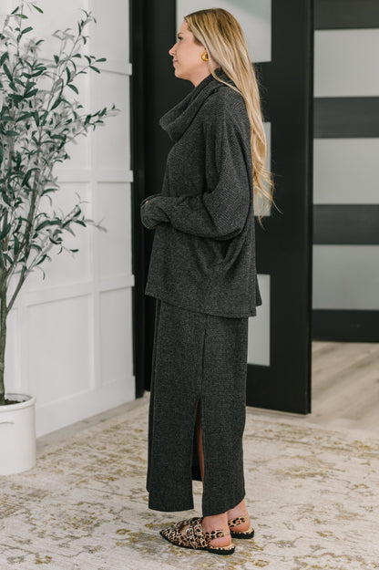 Side angle of Wannetta Set in Black highlighting relaxed silhouette and dolman sleeves.
