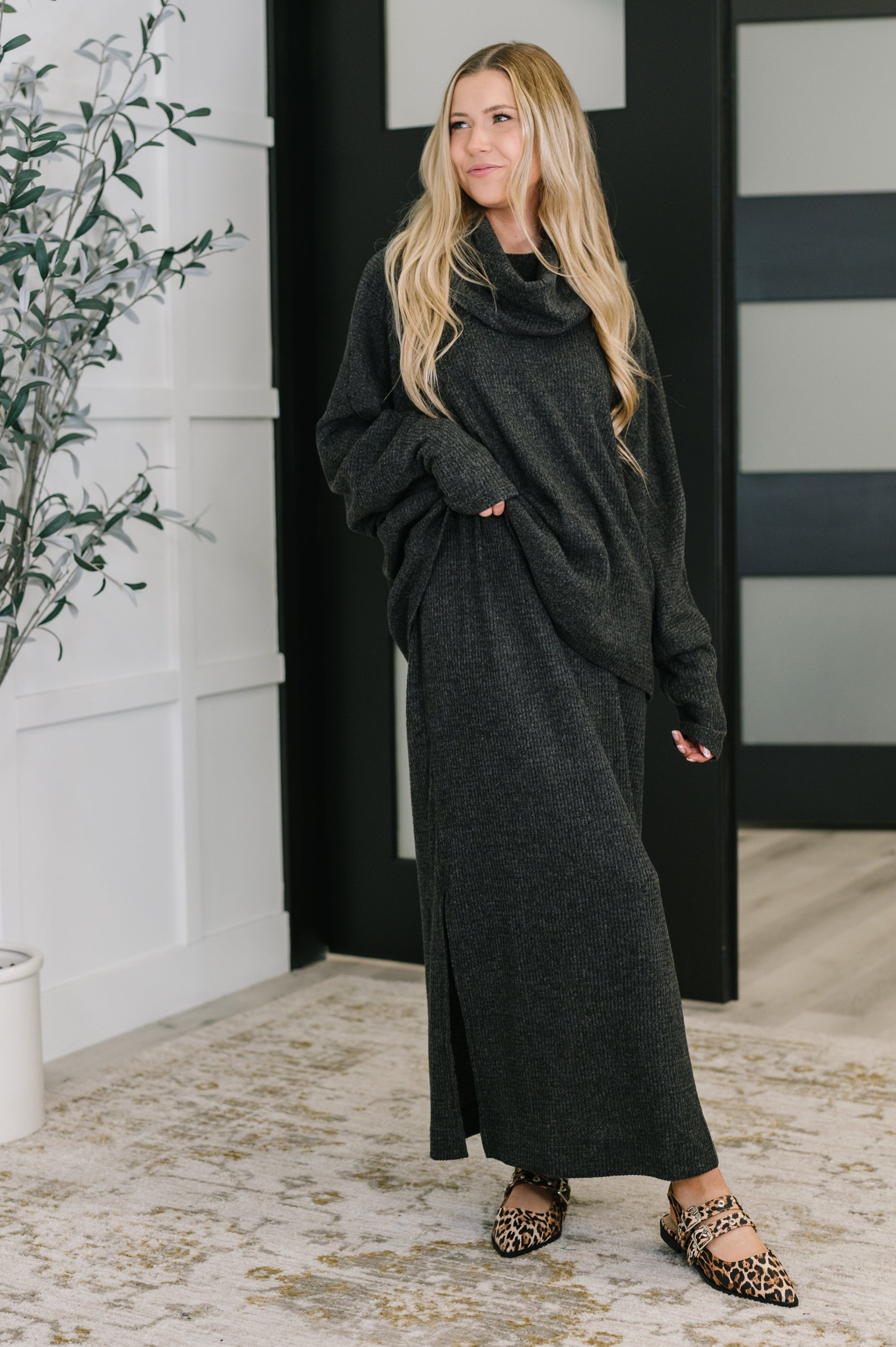 Model wearing Wannetta Set in Black layered for casual chic lounge or travel style.