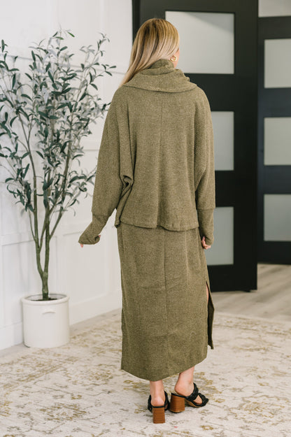 Back view of Wannetta Set in Olive with long sleeve cowl neck top and smooth knit texture.