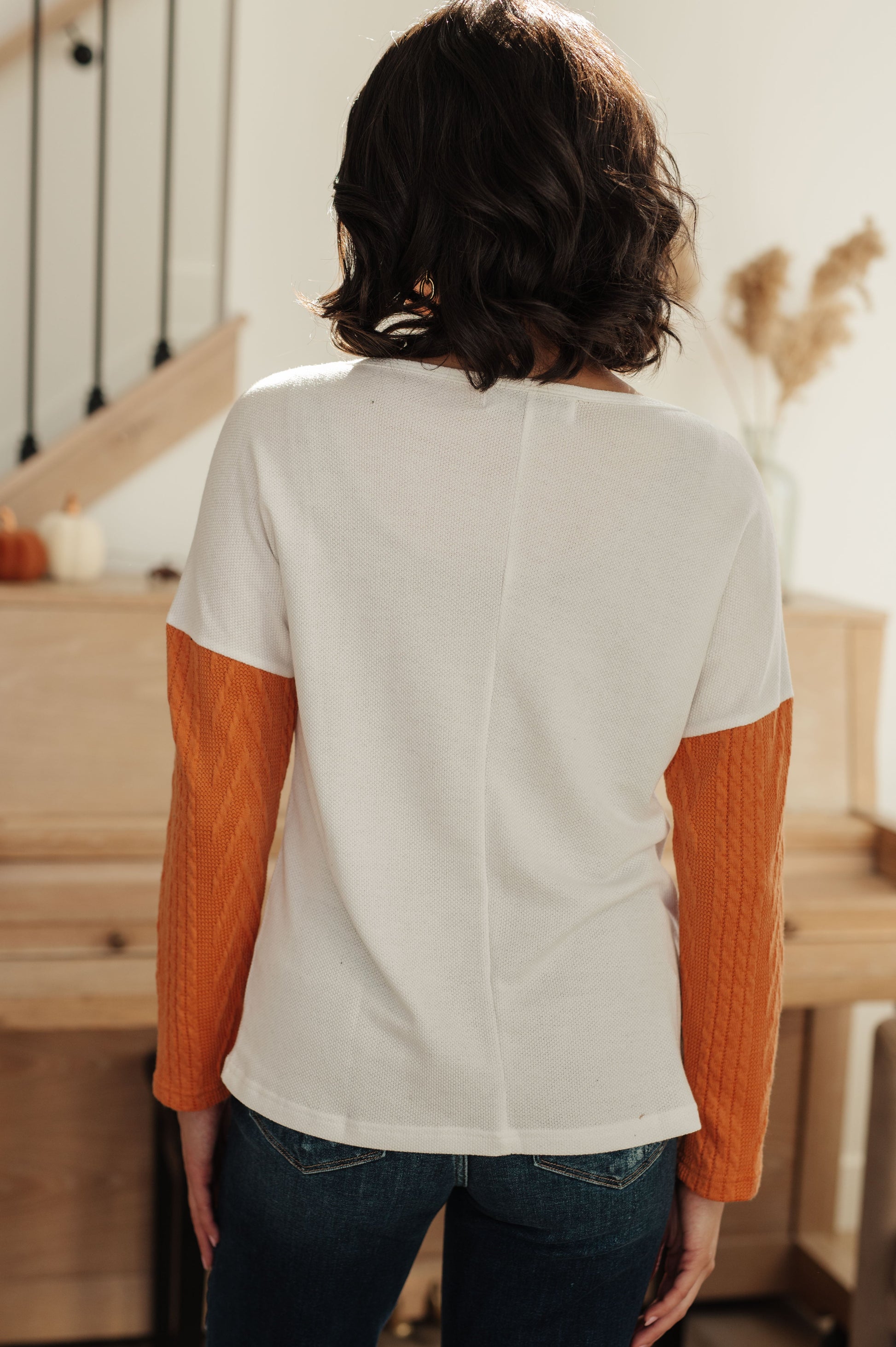 Back view of Cleo Colorblock Top in colorblock knit design