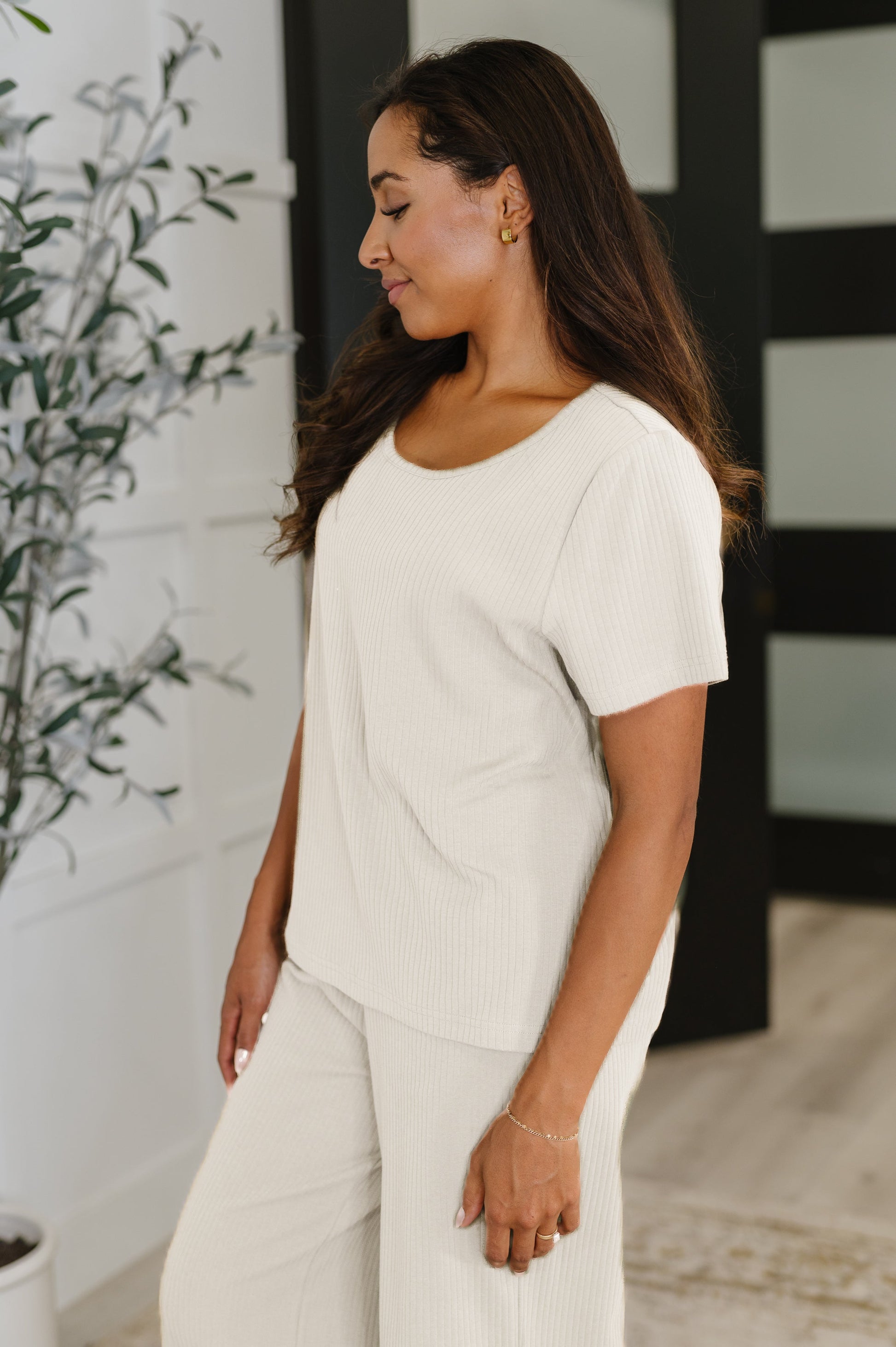 Thyme Boxy Tee in Cream side angle highlighting boxy fit and soft ribbed fabric