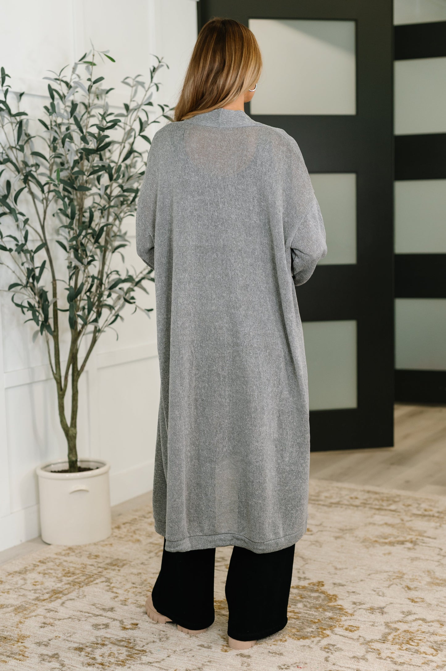 Back view of Teagan Open Front Cardigan in gray with smooth knit and drop shoulder seams.