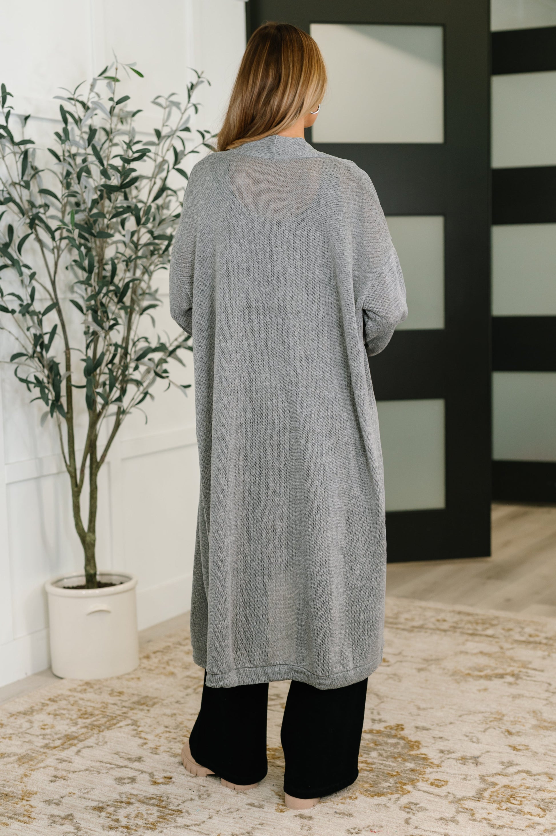 Back view of Teagan Open Front Cardigan in gray with smooth knit and drop shoulder seams.