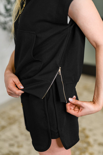 Side close-up of top and shorts highlighting bottom side zipper on top, ribbed texture, and comfy fit of both pieces.