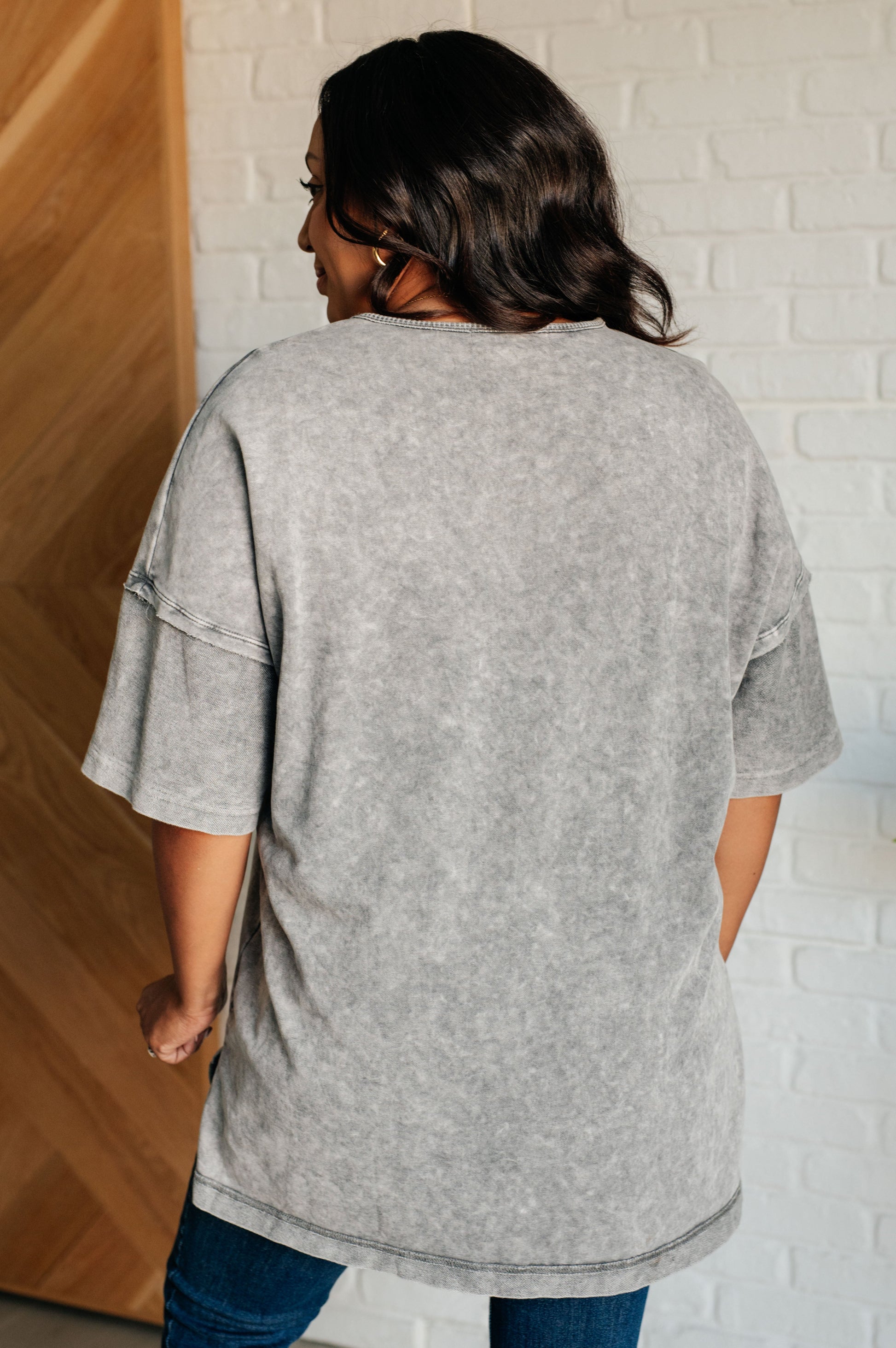 Women's Ubon Mineral Wash Top in gray featuring a round neck, short sleeves with drop shoulders, raw edge details, stepped hem, and side slits. Made with French terry and waffle knit contrast fabric for a laid-back, effortless look.