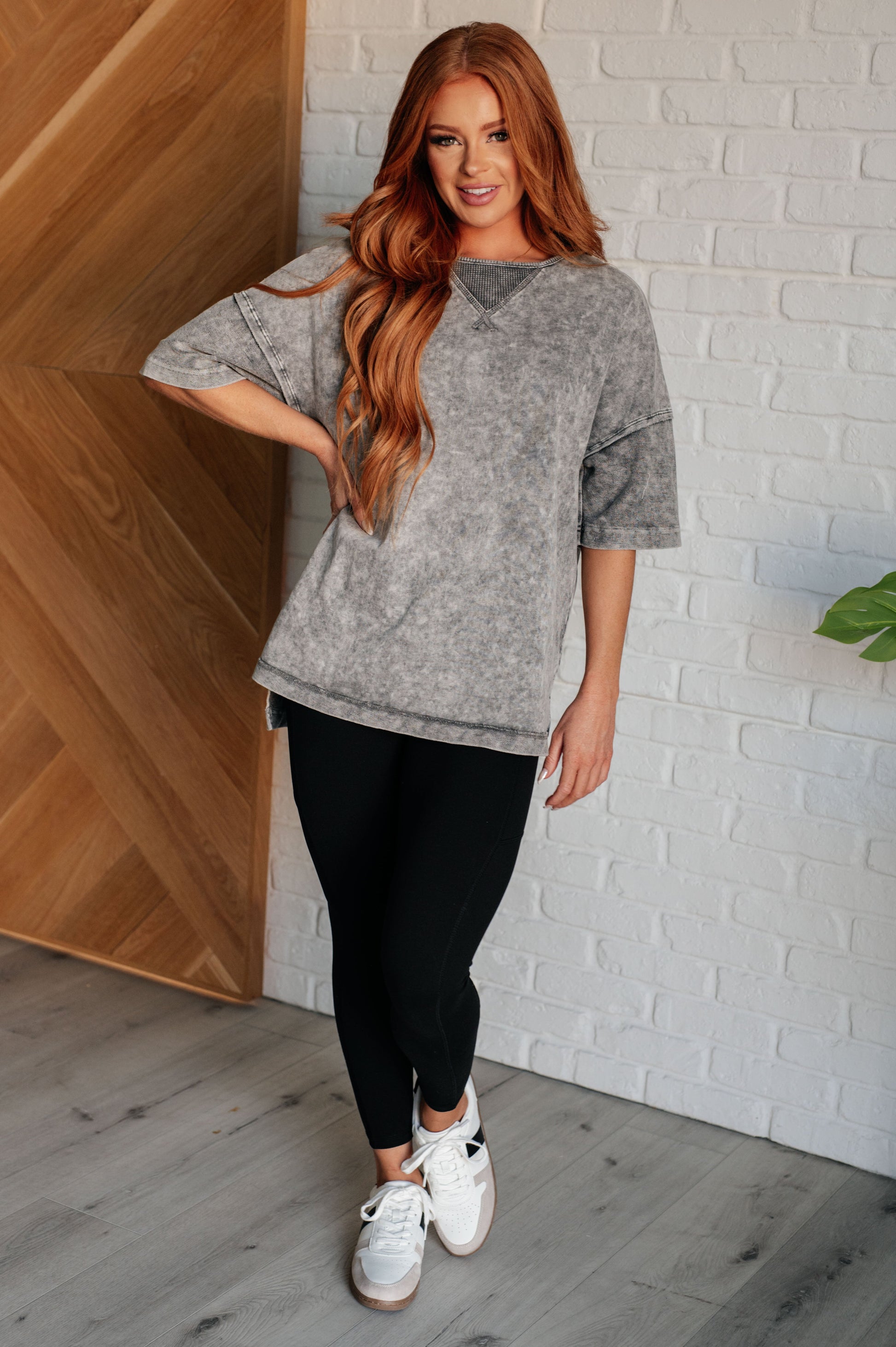 Women's Ubon Mineral Wash Top in gray featuring a round neck, short sleeves with drop shoulders, raw edge details, stepped hem, and side slits. Made with French terry and waffle knit contrast fabric for a laid-back, effortless look.