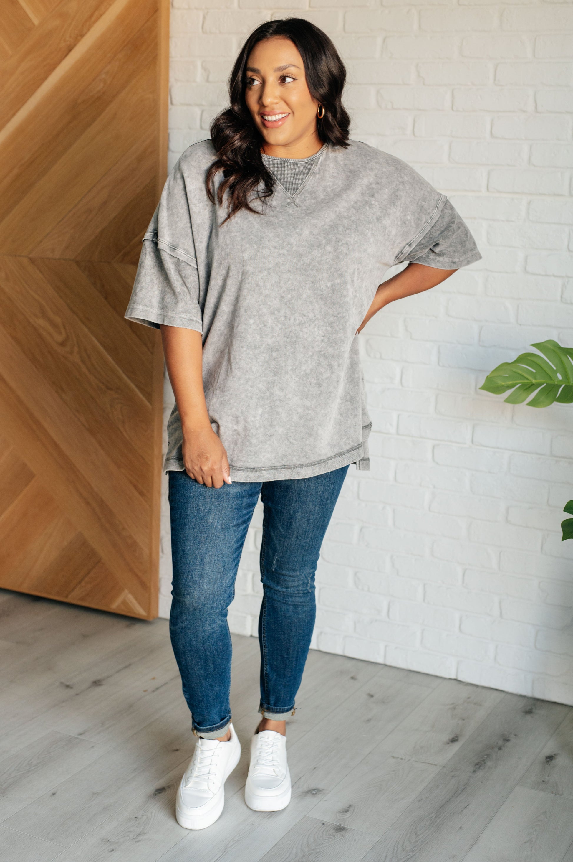 Women's Ubon Mineral Wash Top in gray featuring a round neck, short sleeves with drop shoulders, raw edge details, stepped hem, and side slits. Made with French terry and waffle knit contrast fabric for a laid-back, effortless look.