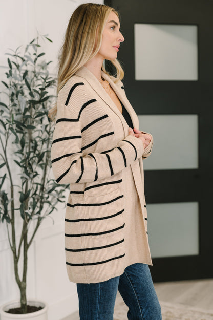 Side view of Keziah Striped Cardigan featuring shawl neckline and patch pockets.