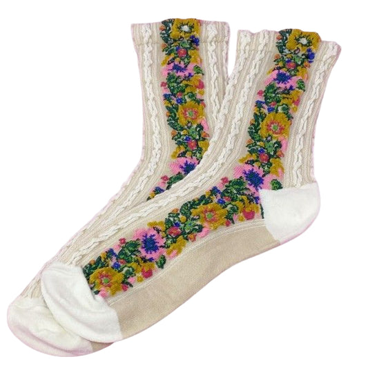 Pair of white Noble Floral Beauty Socks with colorful embroidered side floral design.