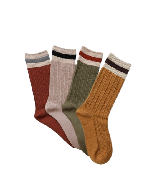 Flat lay of all Simone Color Block Socks in rust, tan, green, and mustard