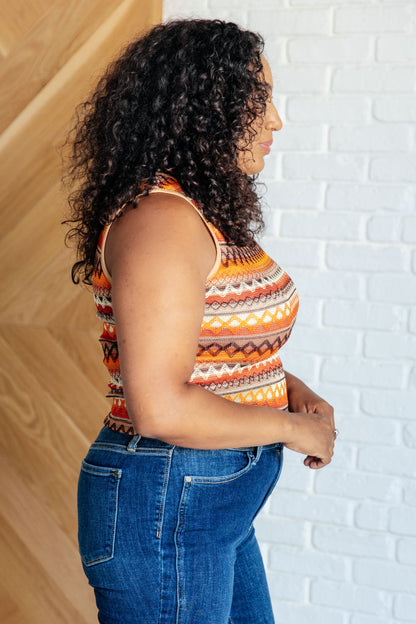 Fashion-forward plus size sleeveless knit tank, perfect for adding a pop of color with its unique geometric design.