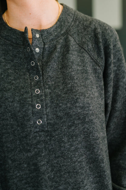 Snap button closure and soft mélange Hacci fabric on Murphy Black Pullover.