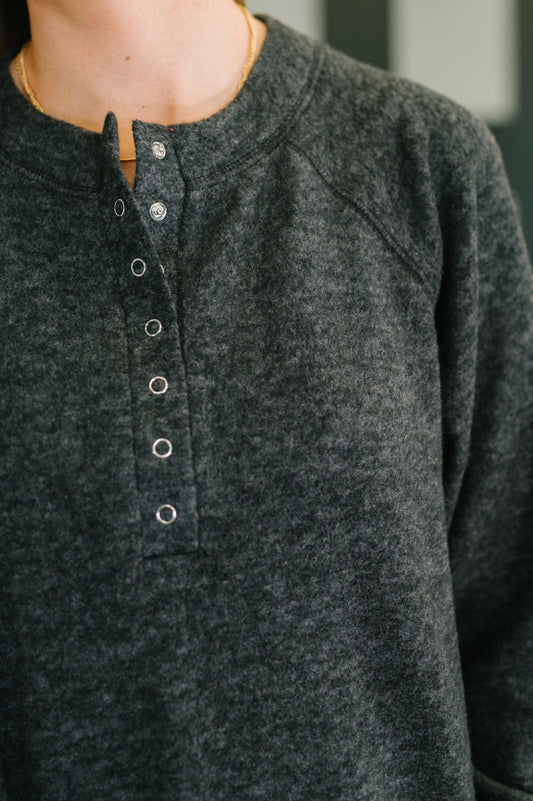 Snap button closure and soft mélange Hacci fabric on Murphy Black Pullover.