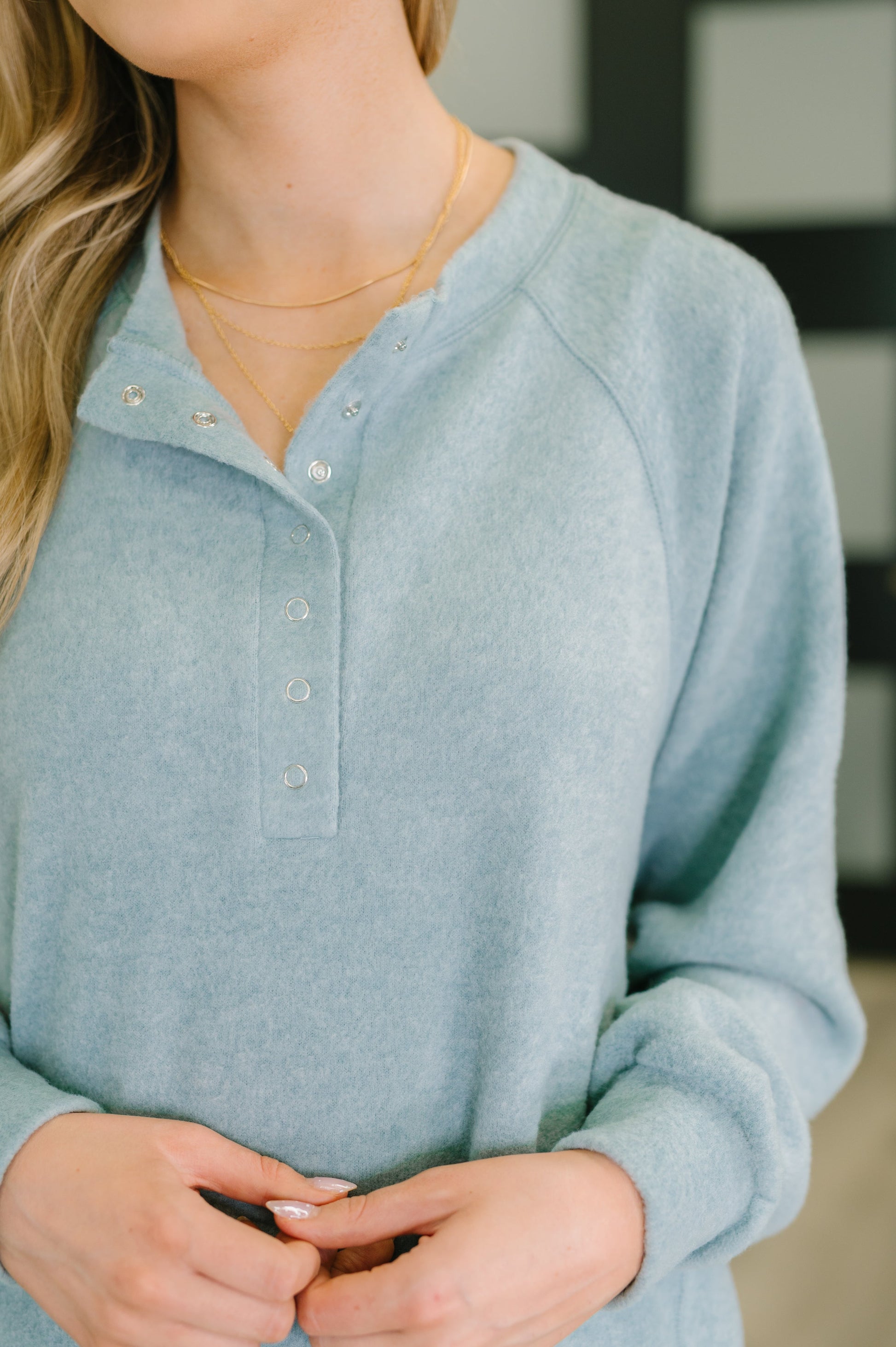 Snap button closure and soft mélange Hacci fabric on Murphy Blue Grey Pullover.