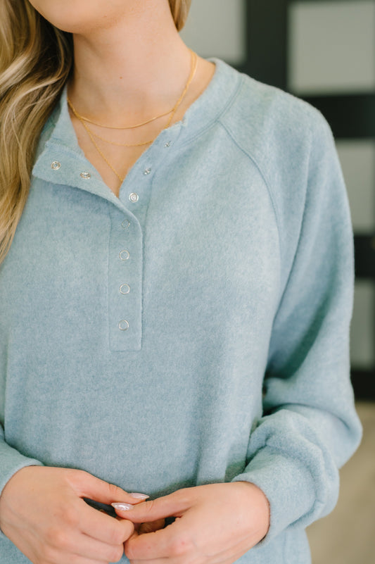 Snap button closure and soft mélange Hacci fabric on Murphy Blue Grey Pullover.