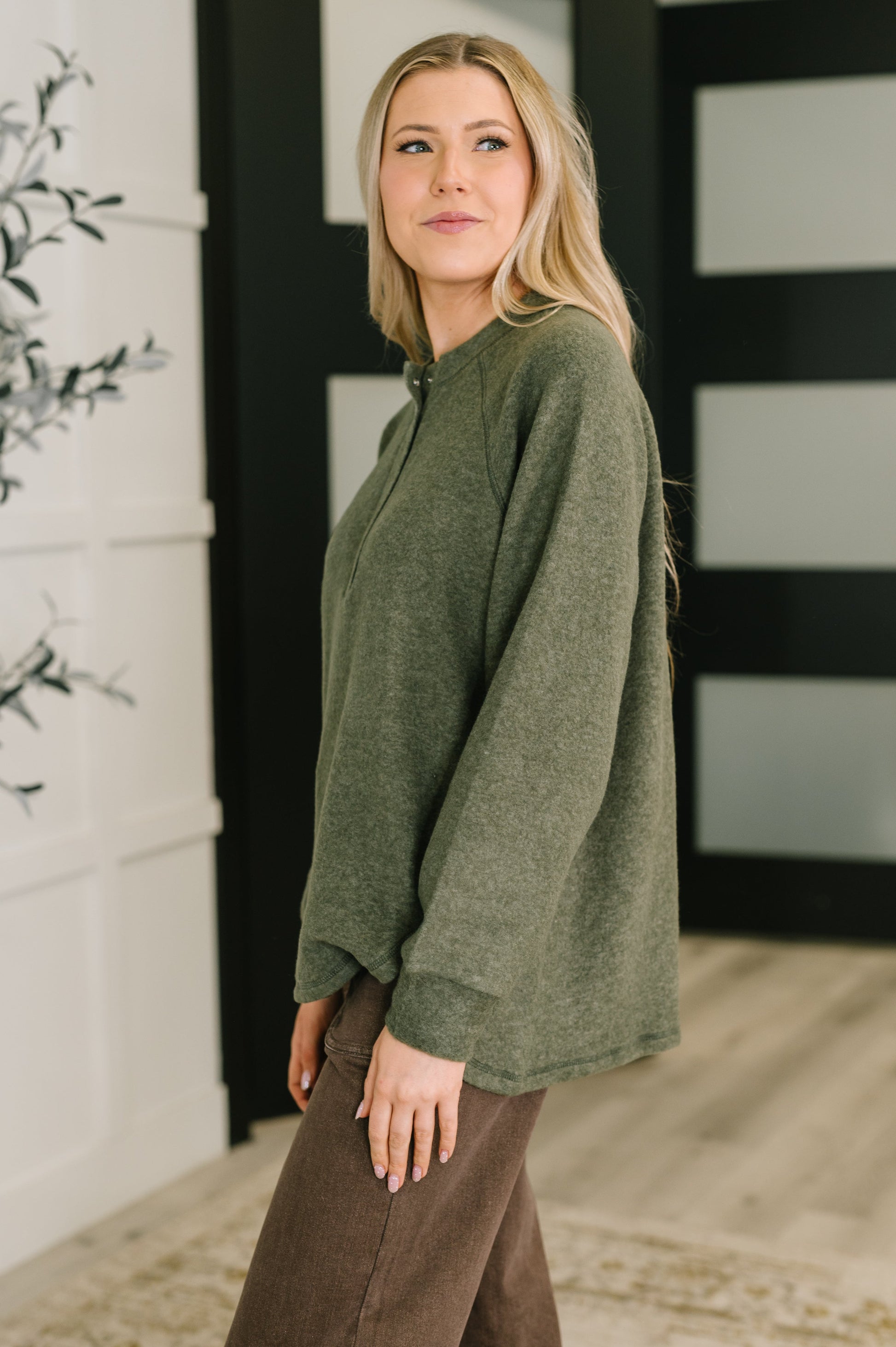 Murphy Olive Pullover side view highlighting scooped hi-low hem