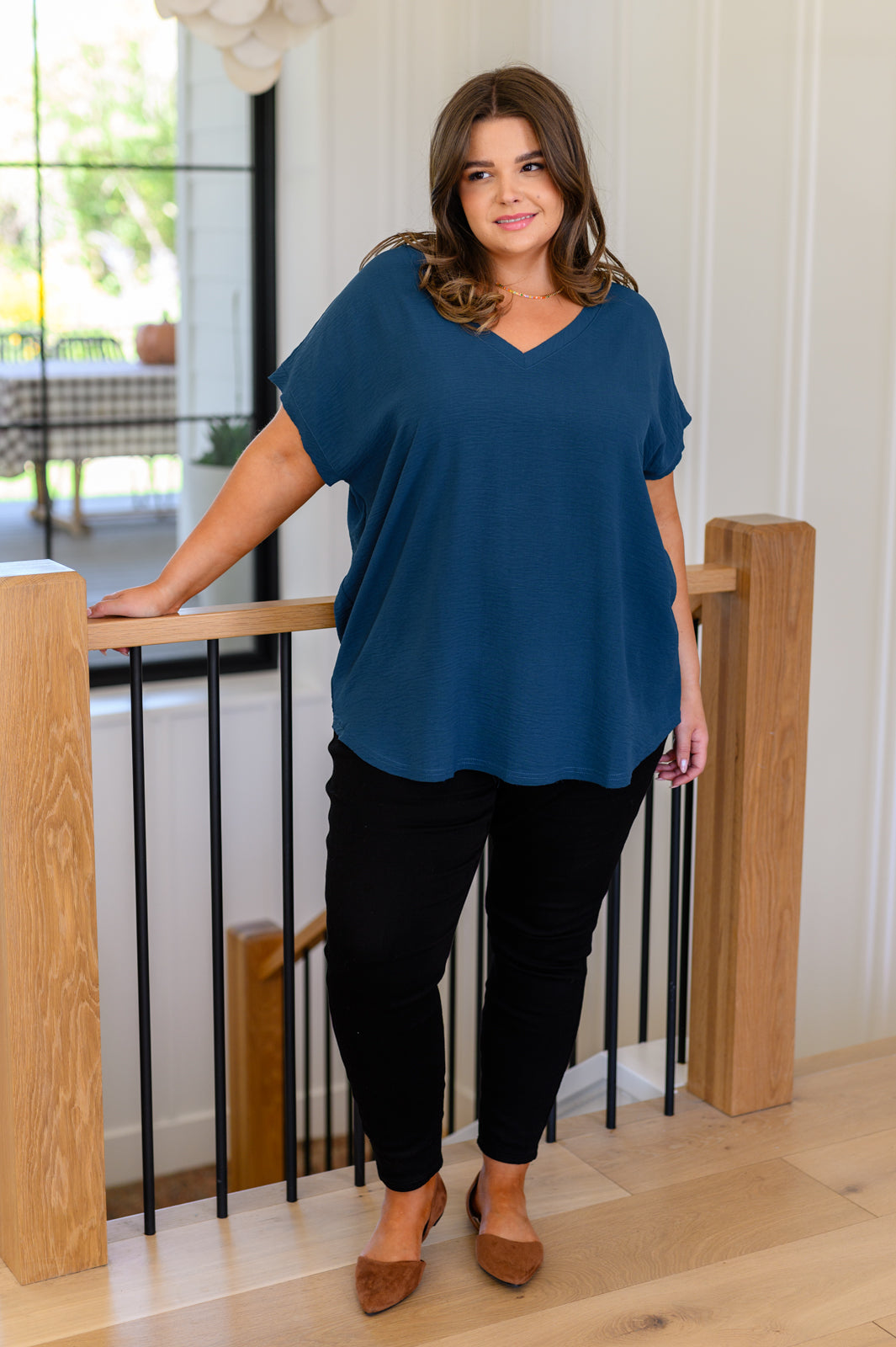 Women's V-Neck Top in Deep Teal, crafted from crinkle woven fabric with a flattering v-neckline and flowy fit.