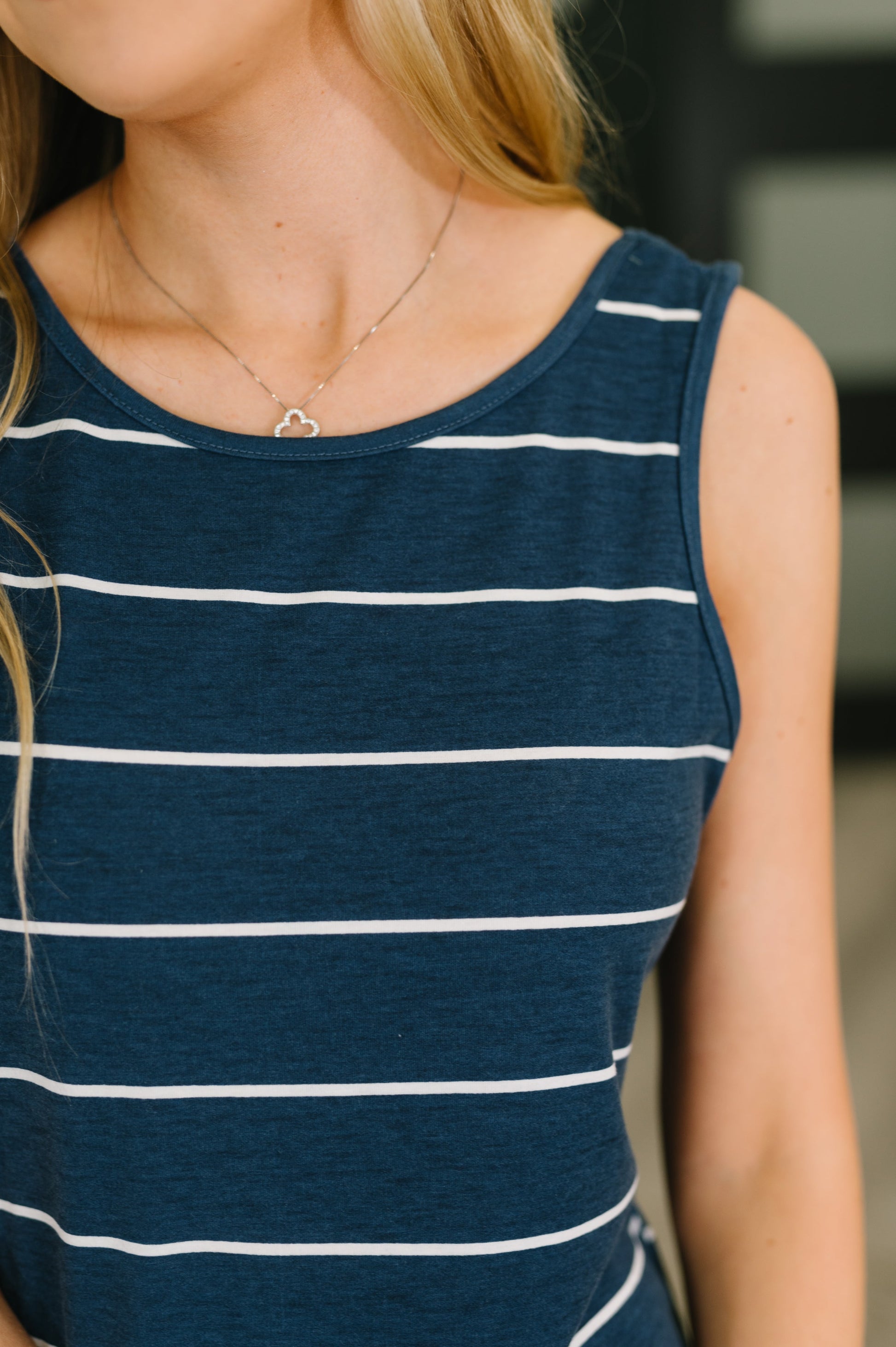 Detail shot of Viera Striped Maxi Dress neckline and fabric stretch.