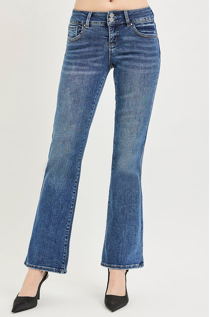 Angled view of Vinny Bootcut Jeans by Risen flattering low rise silhouette.